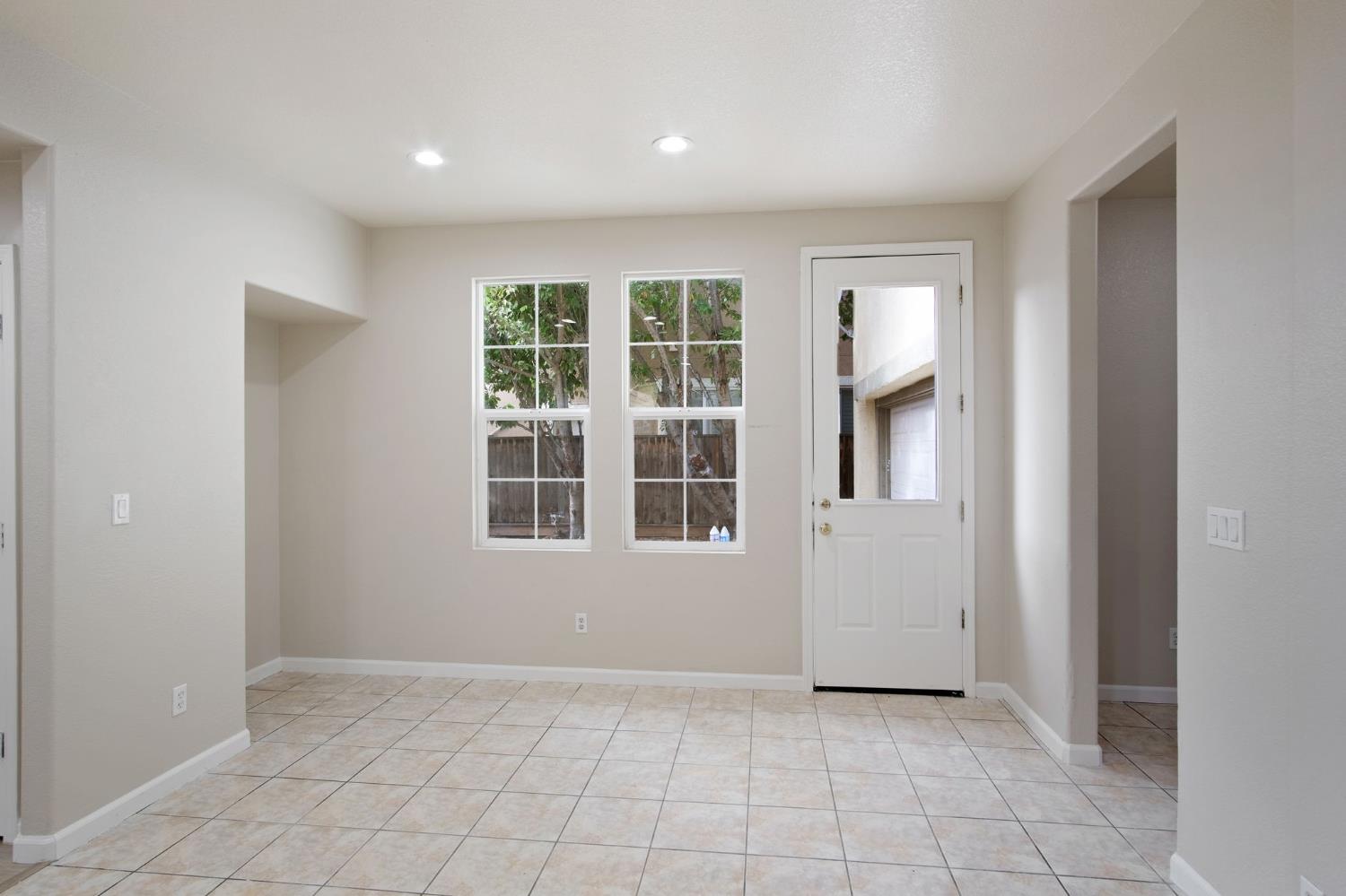 2921 Compton Place Tracy, CA 95377 - Photo 14 of 35 an empty room with windows