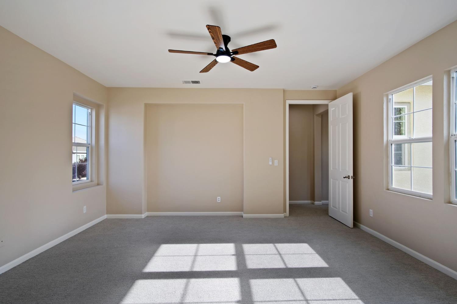 2921 Compton Place Tracy, CA 95377 - Photo 29 of 35 a view of a livingroom with a ceiling fan and window