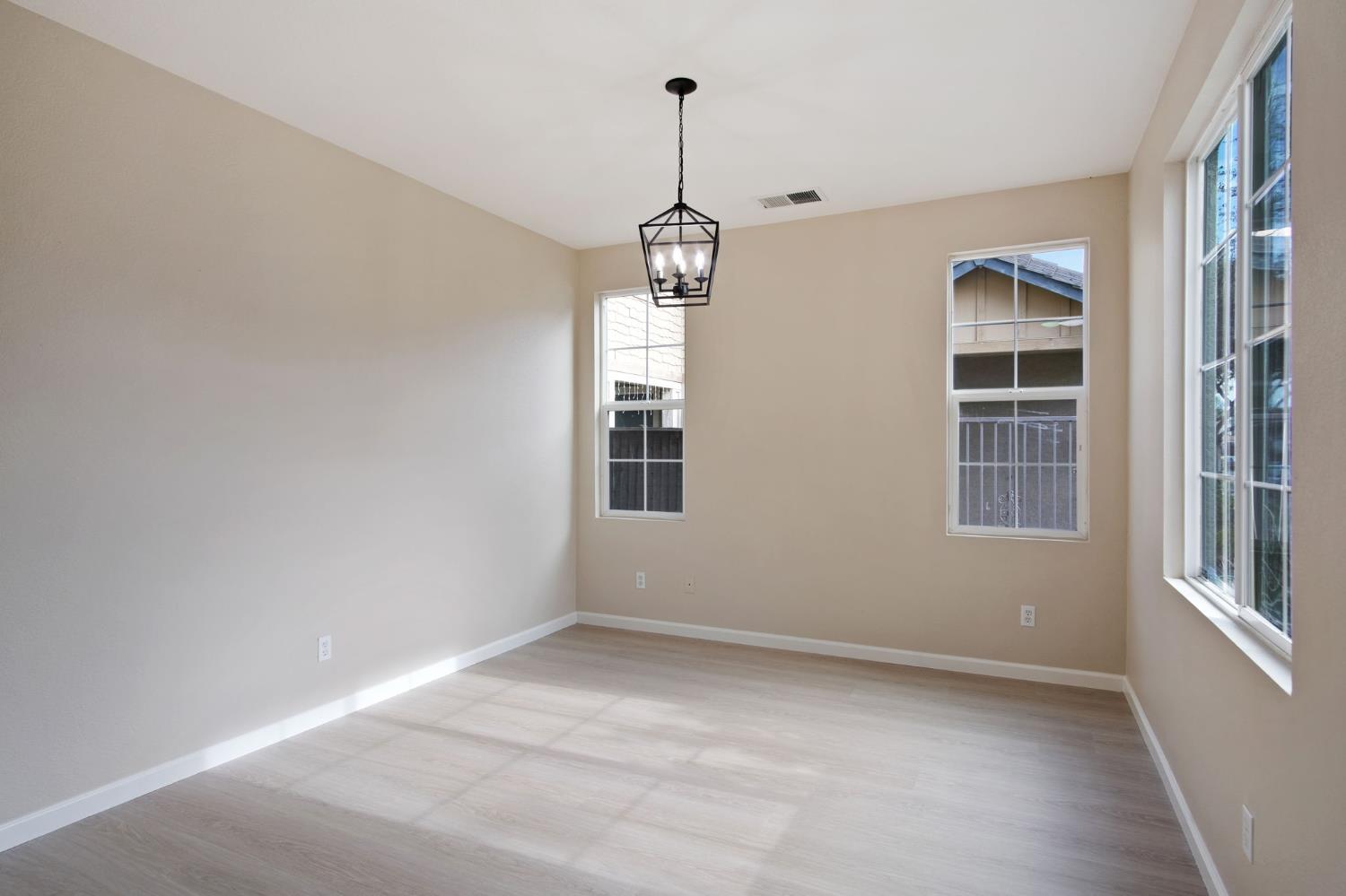 2921 Compton Place Tracy, CA 95377 - Photo 5 of 35 a view of empty room with windows