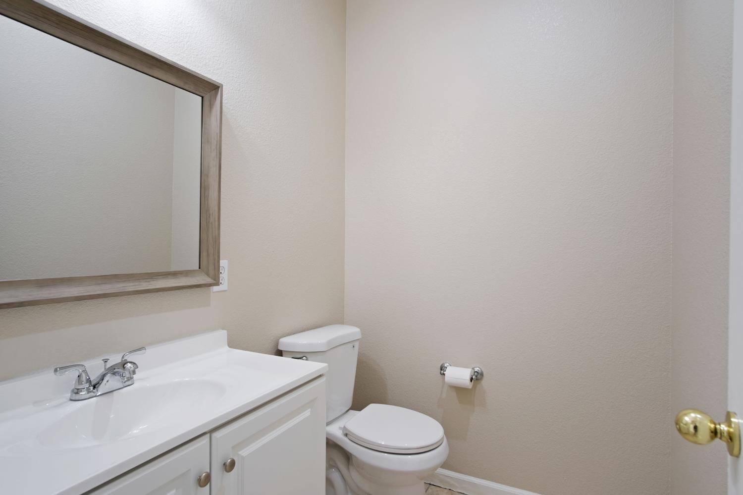 2921 Compton Place Tracy, CA 95377 - Photo 7 of 35 a white toilet sitting next to a white sink