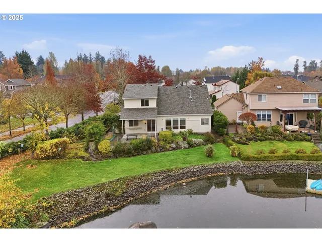 a view of a town with brick building in the background