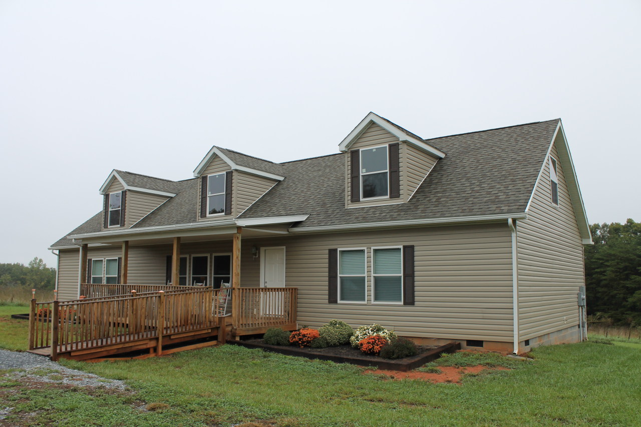4825 Deer View Road Gretna, VA 24557 - Photo 1 of 23 a front view of a house with a yard