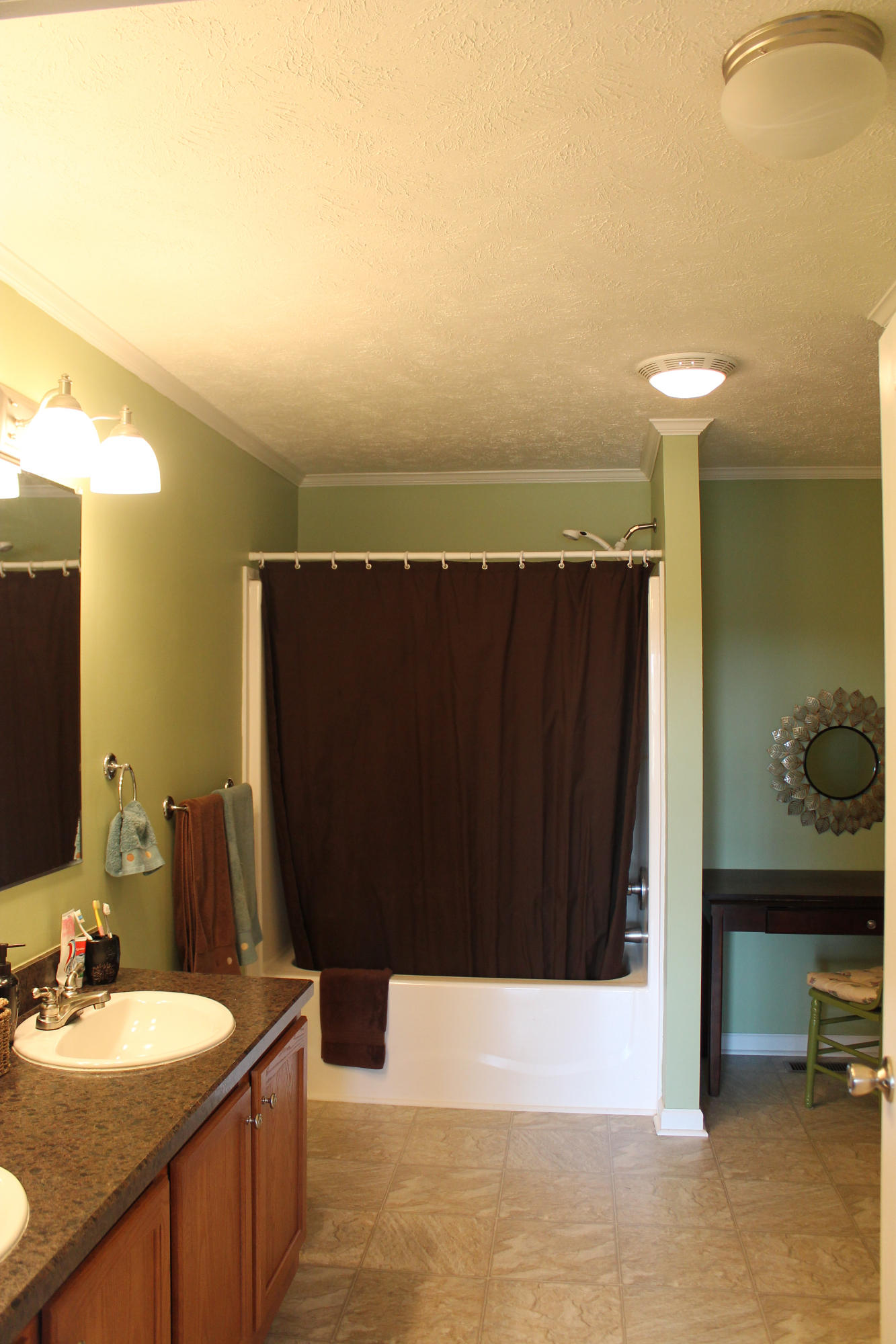 4825 Deer View Road Gretna, VA 24557 - Photo 13 of 23 a bathroom with a sink and a mirror