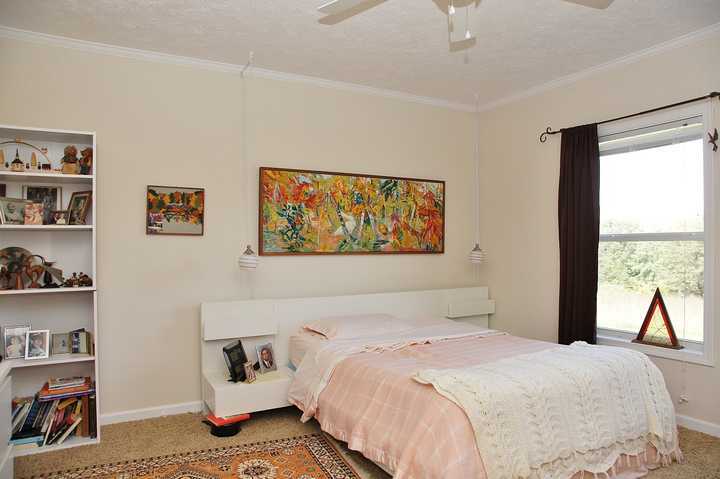 4825 Deer View Road Gretna, VA 24557 - Photo 18 of 23 a bedroom with a bed and a window
