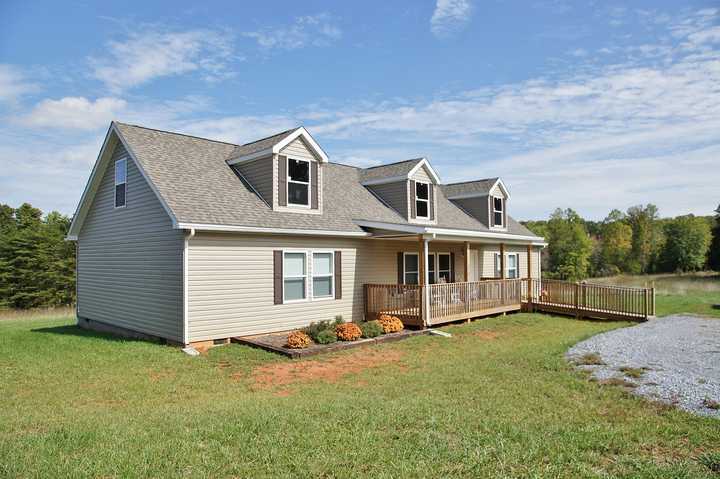 4825 Deer View Road Gretna, VA 24557 - Photo 19 of 23 front view of a house with a yard
