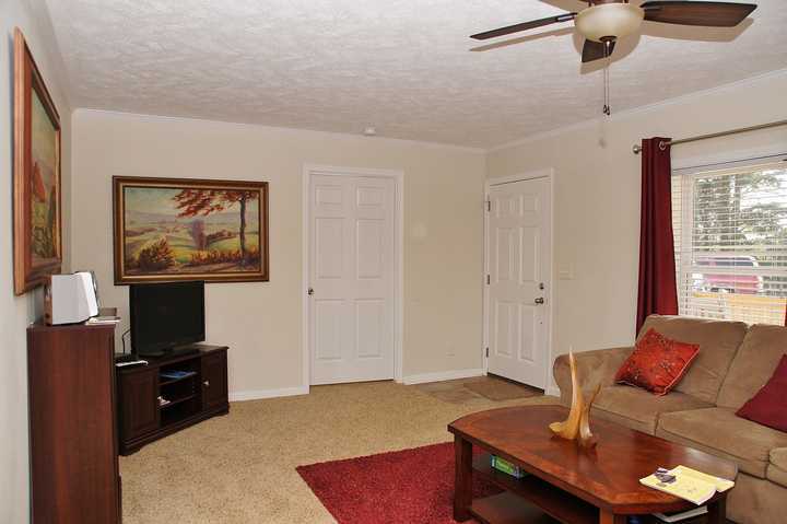 4825 Deer View Road Gretna, VA 24557 - Photo 5 of 23 a living room with furniture and a flat screen tv