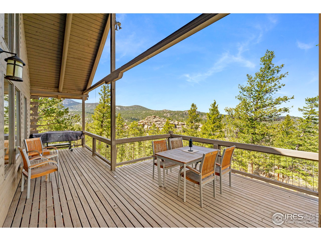 1359 Crow Road Red Feather Lakes, CO 80545 - Photo 7 of 23 Relax and enjoy expansive views from wrap around deck.