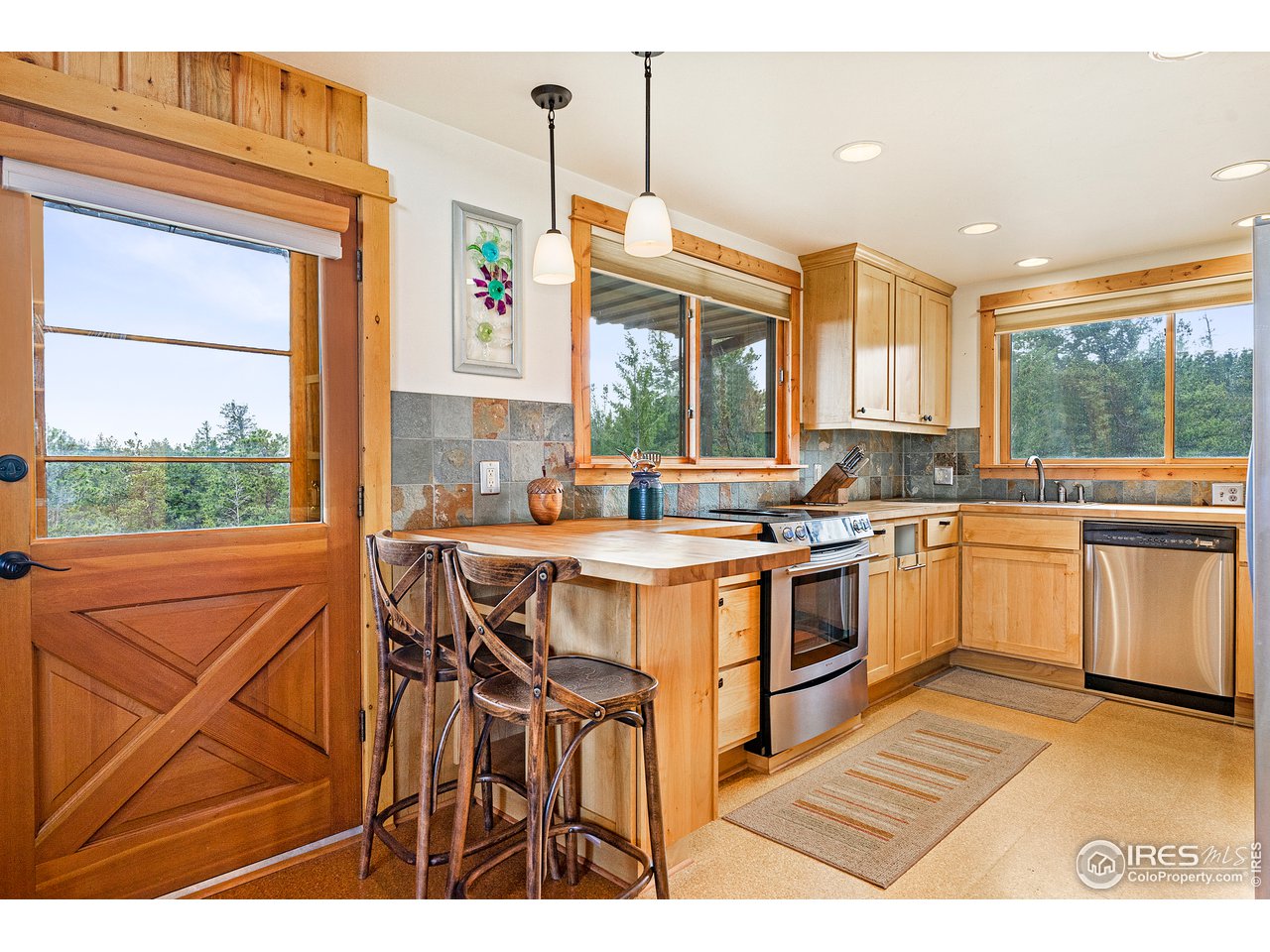 1359 Crow Road Red Feather Lakes, CO 80545 - Photo 8 of 23 Well equipped cozy kitchen.
