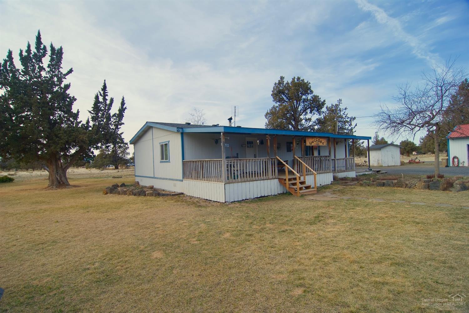 6006 Southwest Cougar Road Terrebonne, OR 97760 - Photo 2 of 20 Front of house with large covered deck