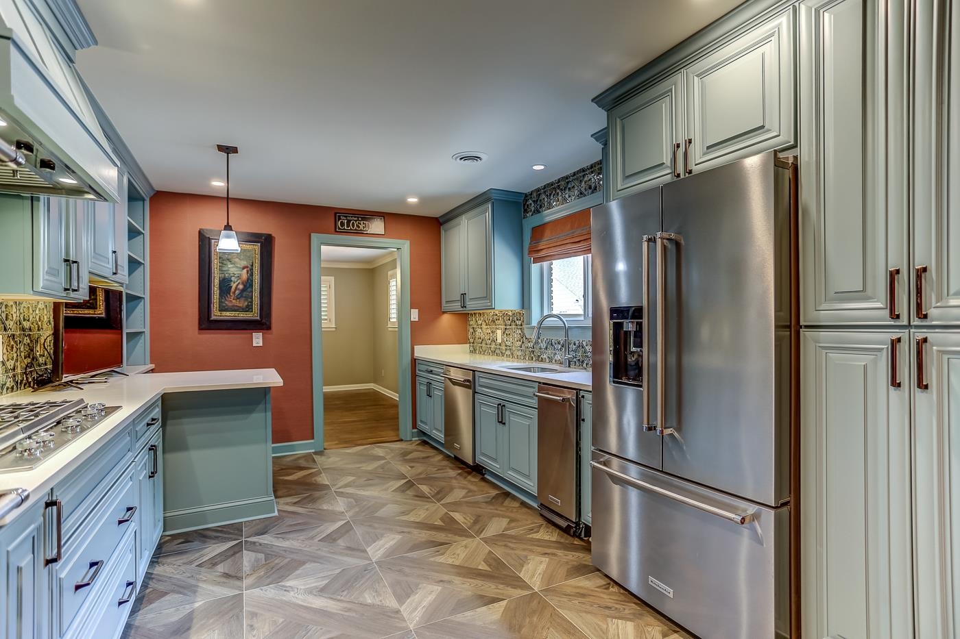 5515 Walnut Grove Road Memphis, TN 38120 - Photo 9 of 37 a kitchen with stainless steel appliances granite countertop a refrigerator and a sink