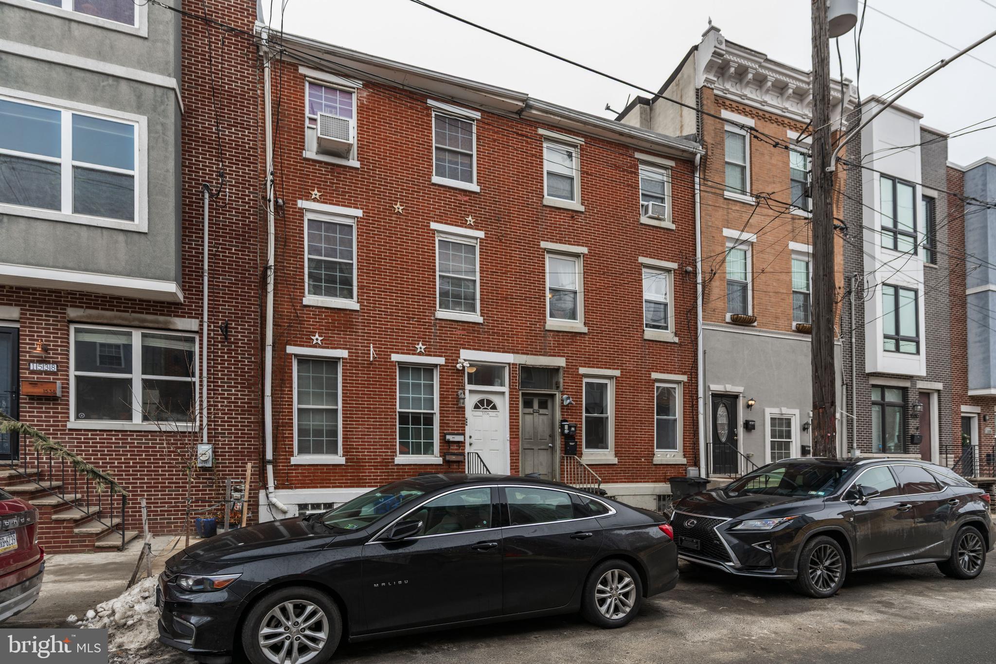 1534 South 4th Street Philadelphia, PA 19147 - Photo 11 of 11 a car parked in front of a building