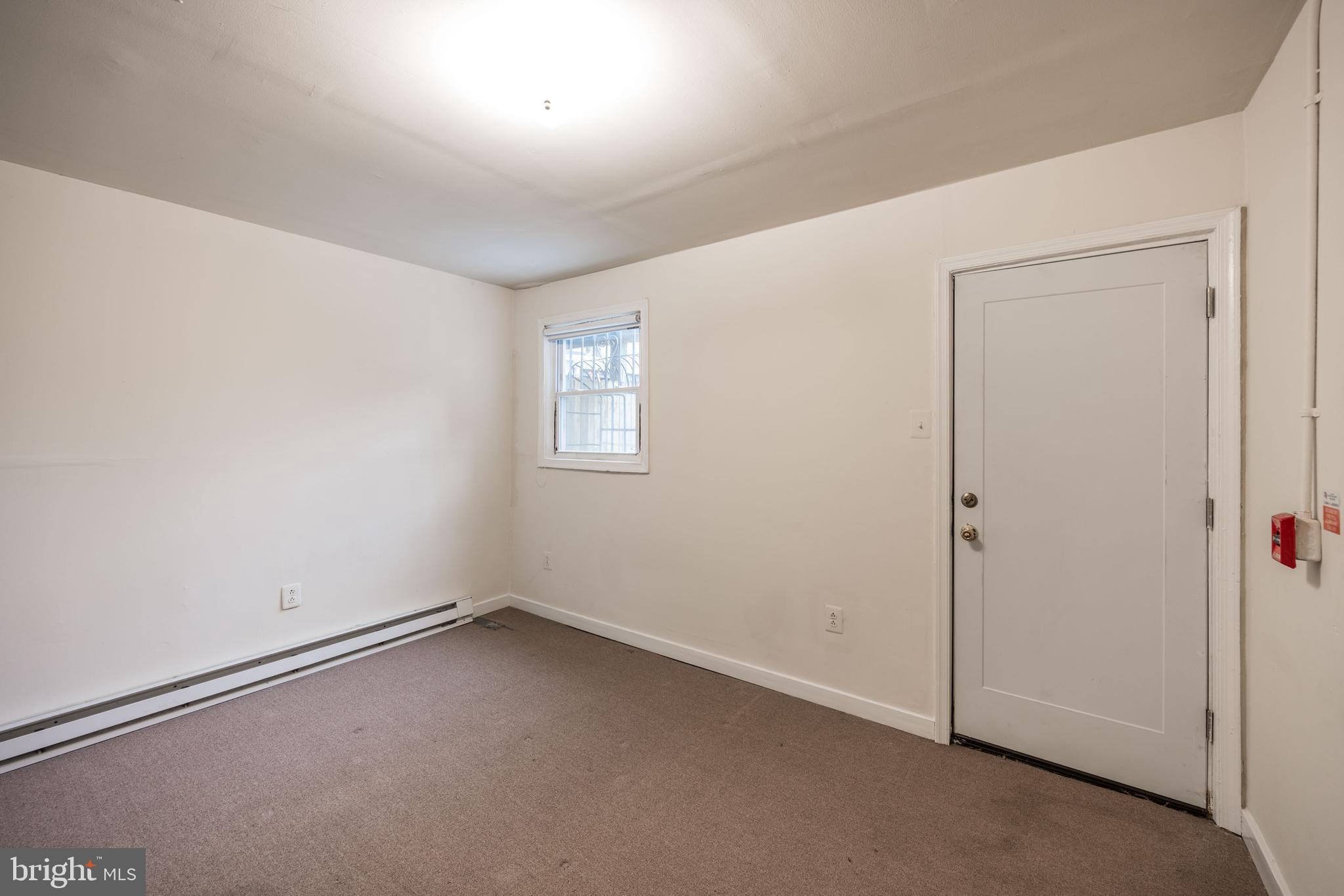 1534 South 4th Street Philadelphia, PA 19147 - Photo 8 of 11 an empty room with a empty space and windows