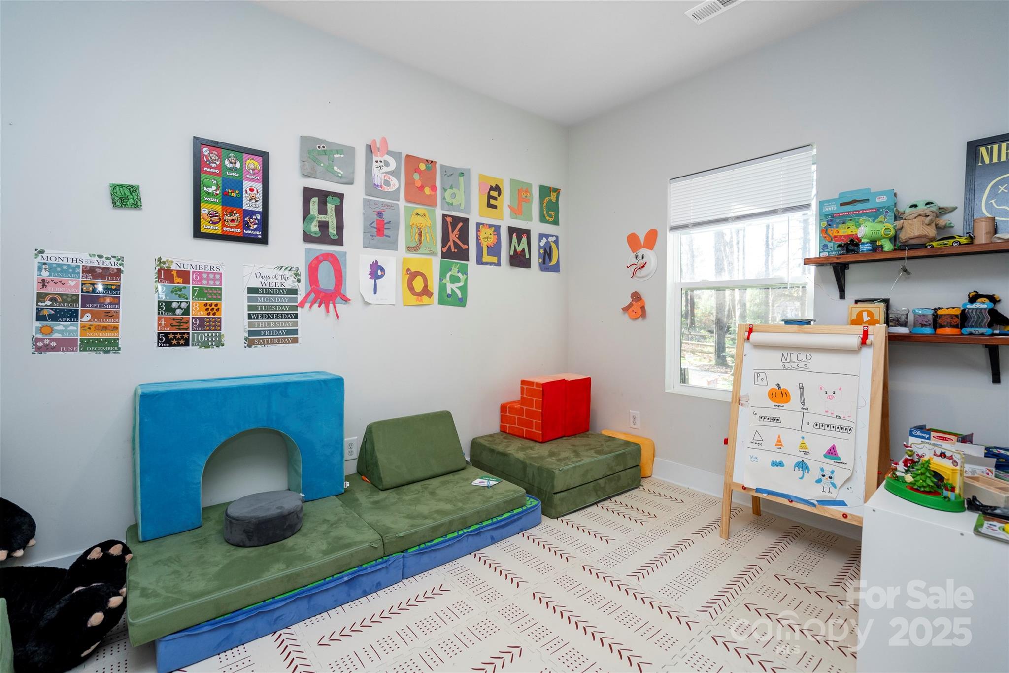 17359 Huntersville-Concord Road Huntersville, NC 28078 - Photo 19 of 41 a room with toys and a living room