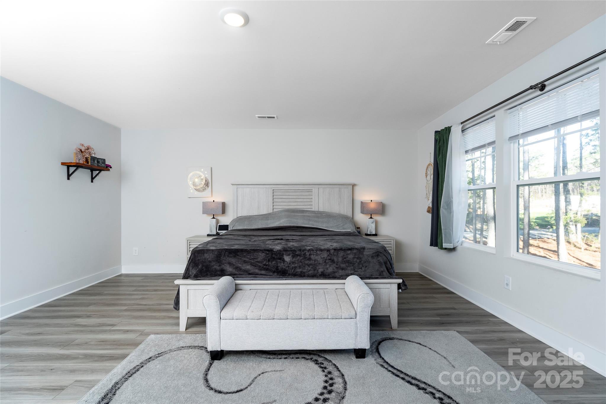 17359 Huntersville-Concord Road Huntersville, NC 28078 - Photo 22 of 41 a bedroom with a bed and window