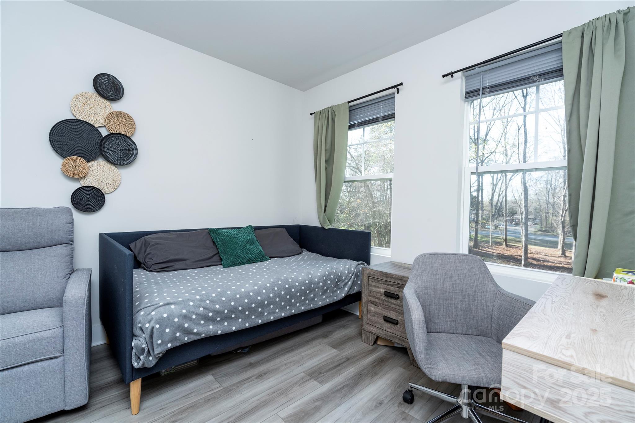 17359 Huntersville-Concord Road Huntersville, NC 28078 - Photo 32 of 41 a bedroom with a bed and cabinets