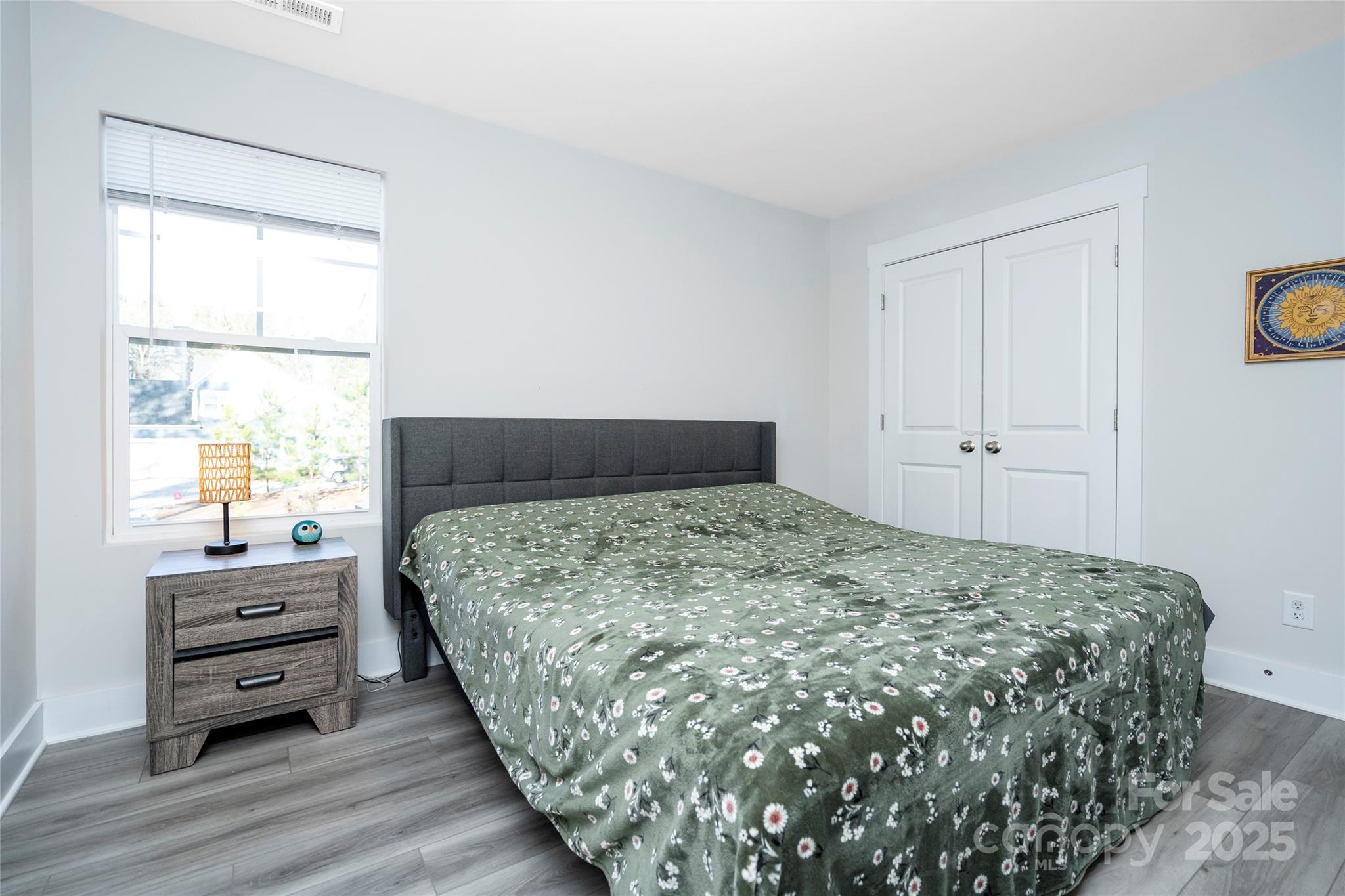 17359 Huntersville-Concord Road Huntersville, NC 28078 - Photo 34 of 41 a bedroom with a bed and a window