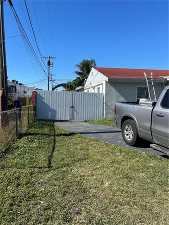 a view of a car in front of a house