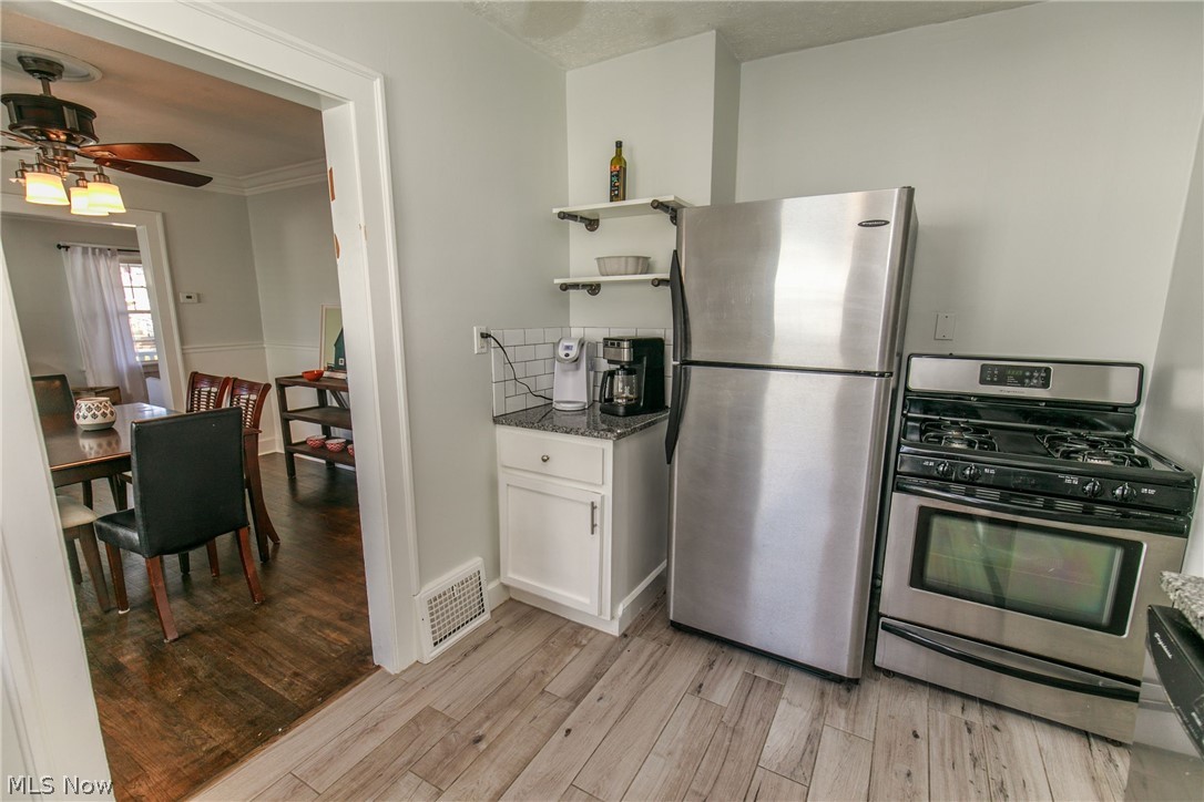 3516 Attica Road Cleveland, OH 44111 - Photo 14 of 27 Adjacent to the dining room makes service from the kitchen most convenient.