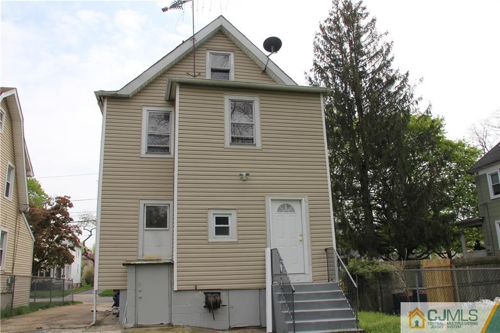 522 Front Street Dunellen, NJ 08812 - Photo 22 of 24 a view of a house with a yard