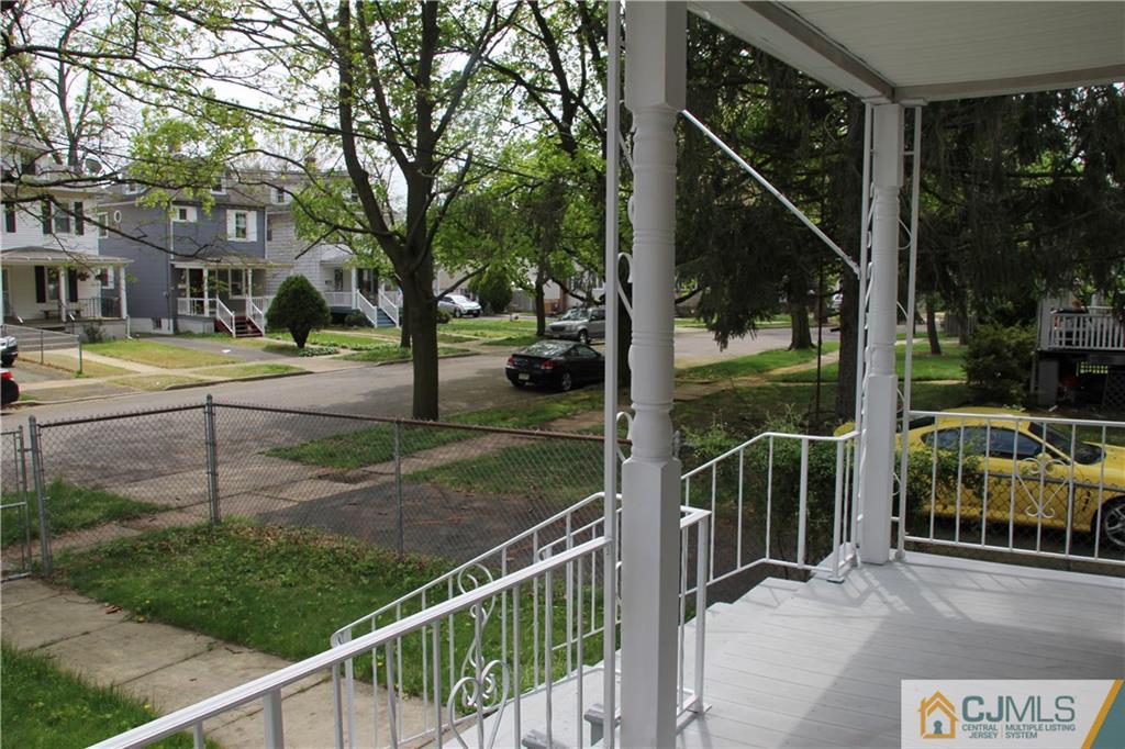 522 Front Street Dunellen, NJ 08812 - Photo 23 of 24 a view of a house with backyard and sitting area