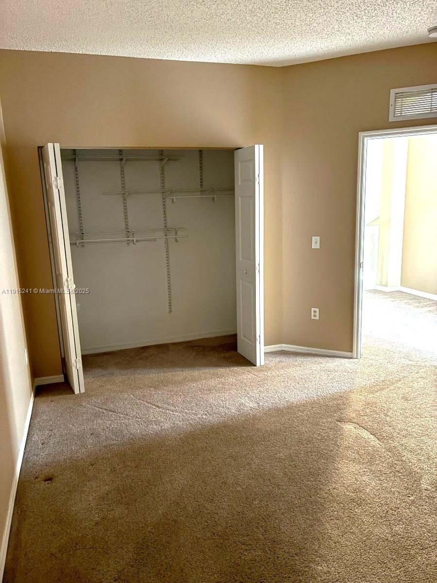 2202 Southeast 17th Avenue Homestead, FL 33035 - Photo 20 of 34 an empty room with closet