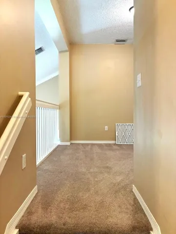 a view of a room with a door