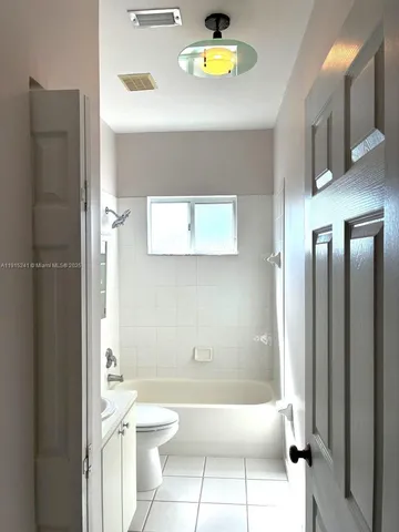 a bathroom with a sink and toilet