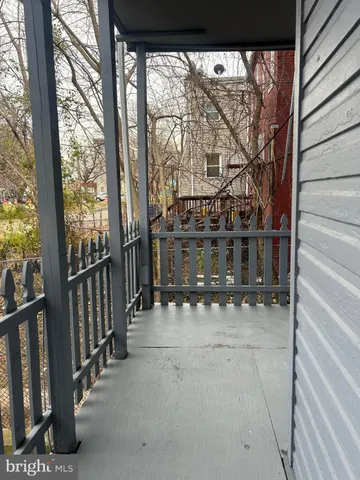 a view of a balcony with an outdoor space