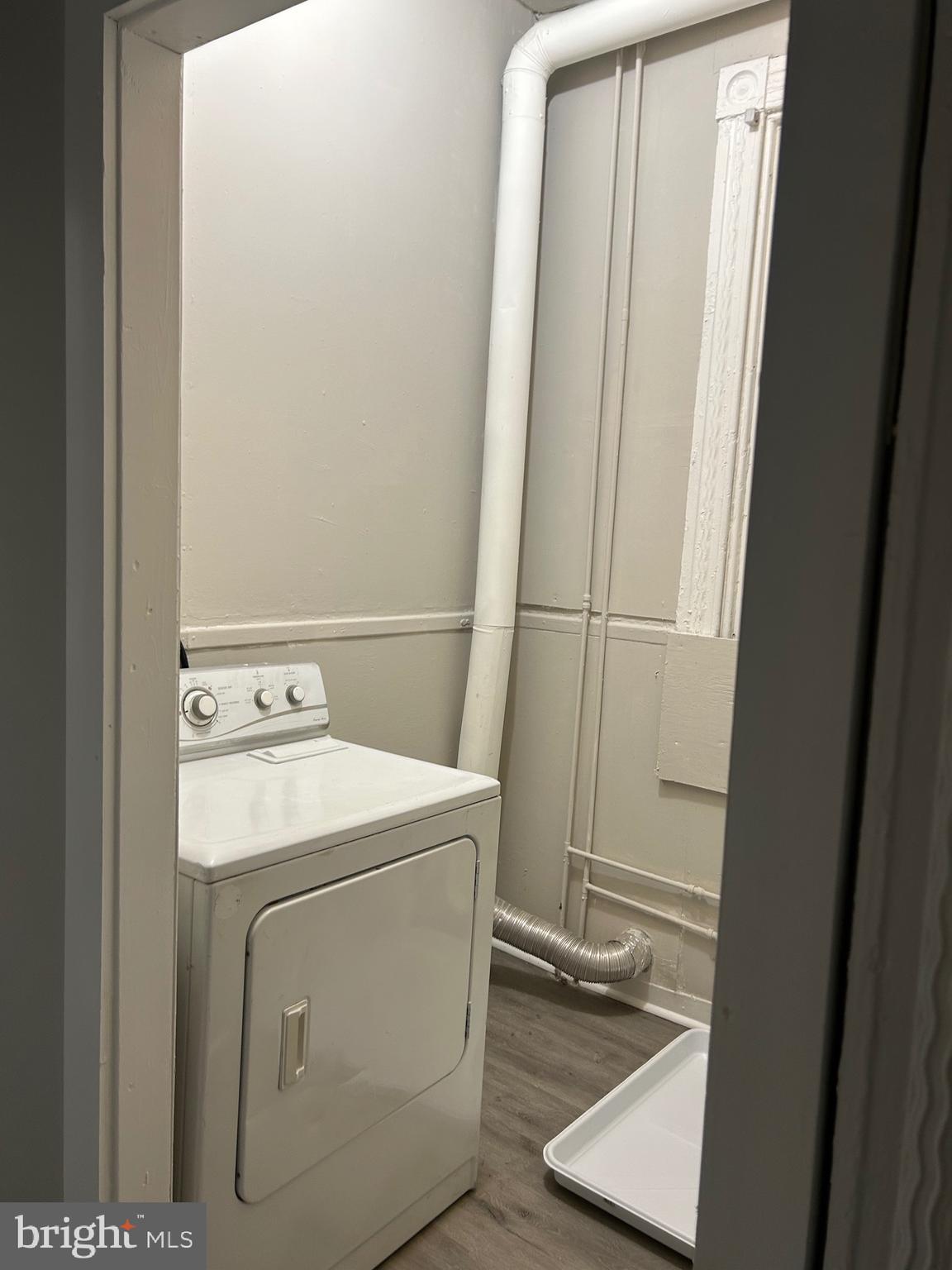 1619 1/2 Division Street Baltimore, MD 21217 - Photo 6 of 22 a utility room with dryer and washer