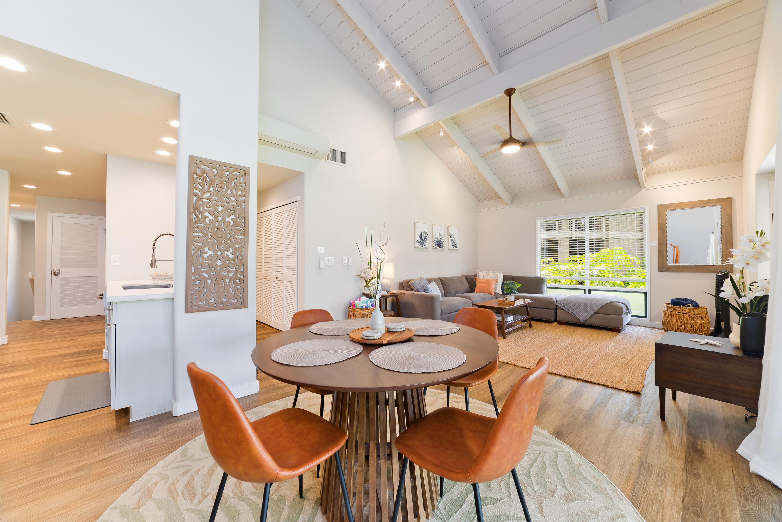 78-261 Manukai Street, Unit 303 Kailua-Kona, HI 96740 - Photo 1 of 30 a dining room with furniture and wooden floor
