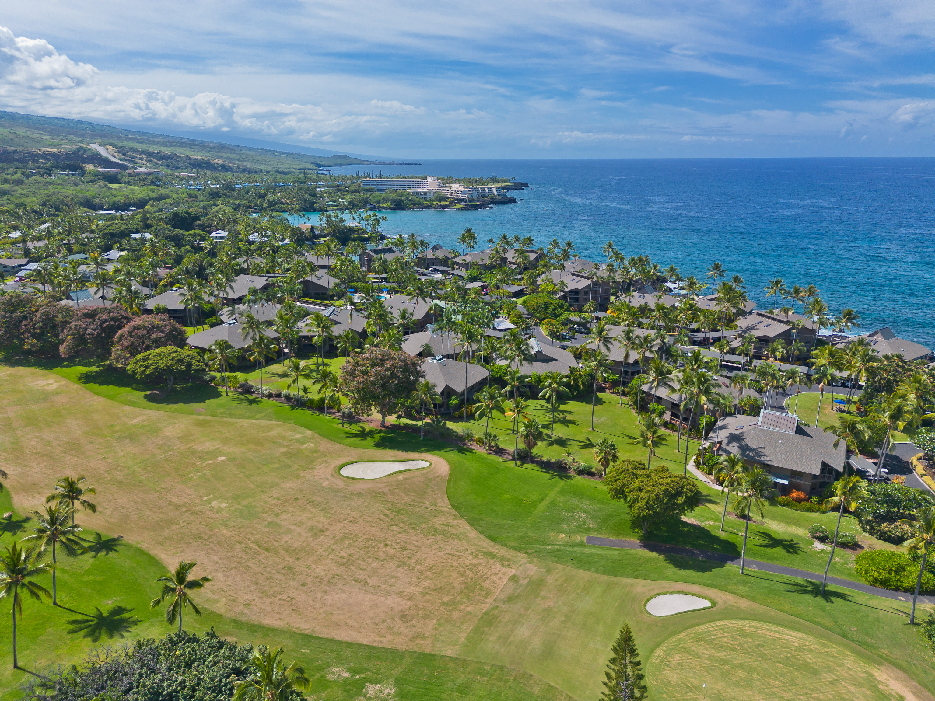 78-261 Manukai Street, Unit 303 Kailua-Kona, HI 96740 - Photo 29 of 30 an aerial view of a houses with a yard