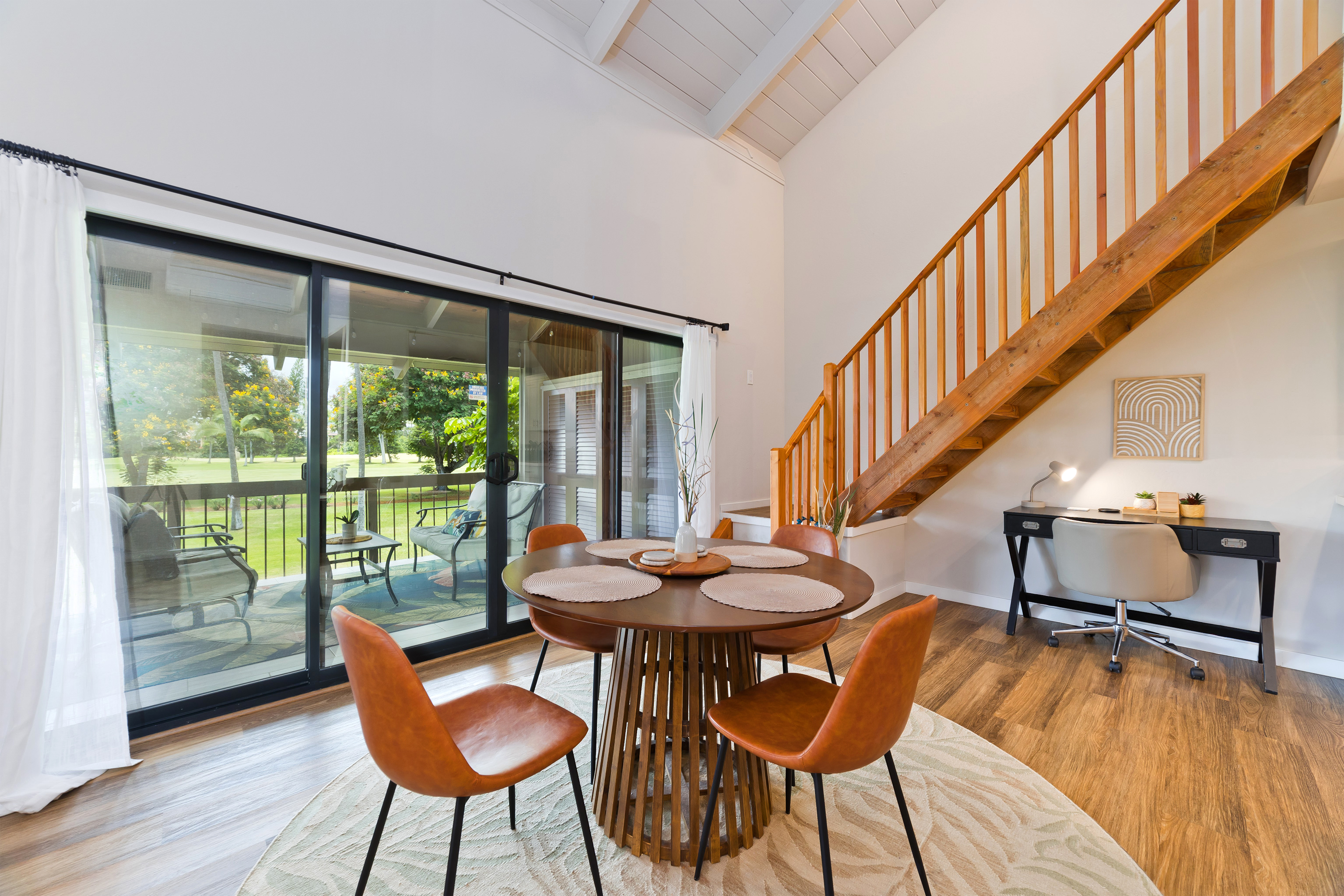 78-261 Manukai Street, Unit 303 Kailua-Kona, HI 96740 - Photo 6 of 30 a dining room with furniture and wooden floor