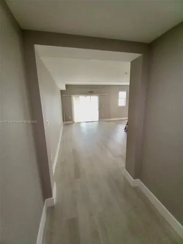 a view of hallway with window