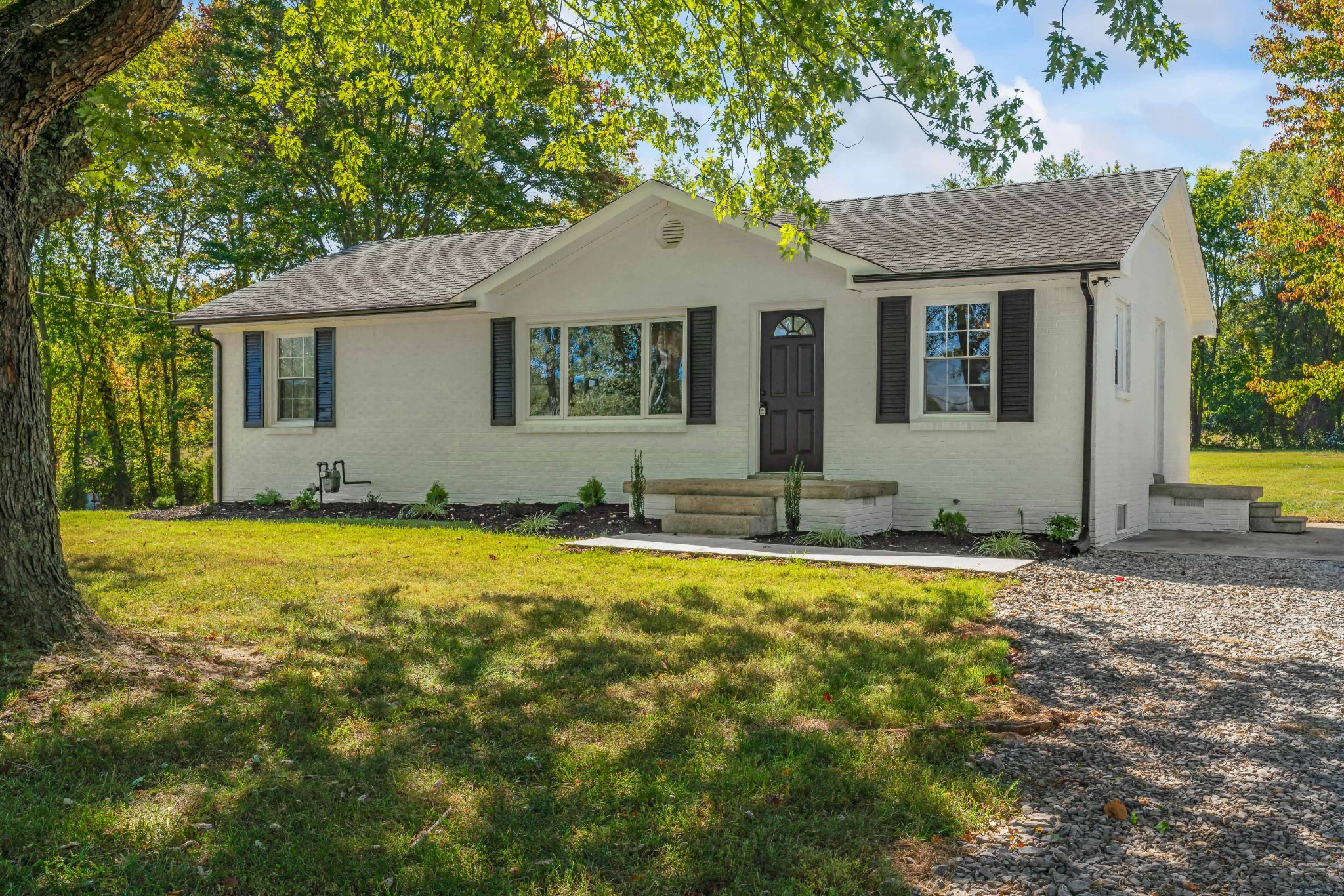 746 Clearview Road Cottontown, TN 37048 - Photo 1 of 64 a front view of a house with a yard