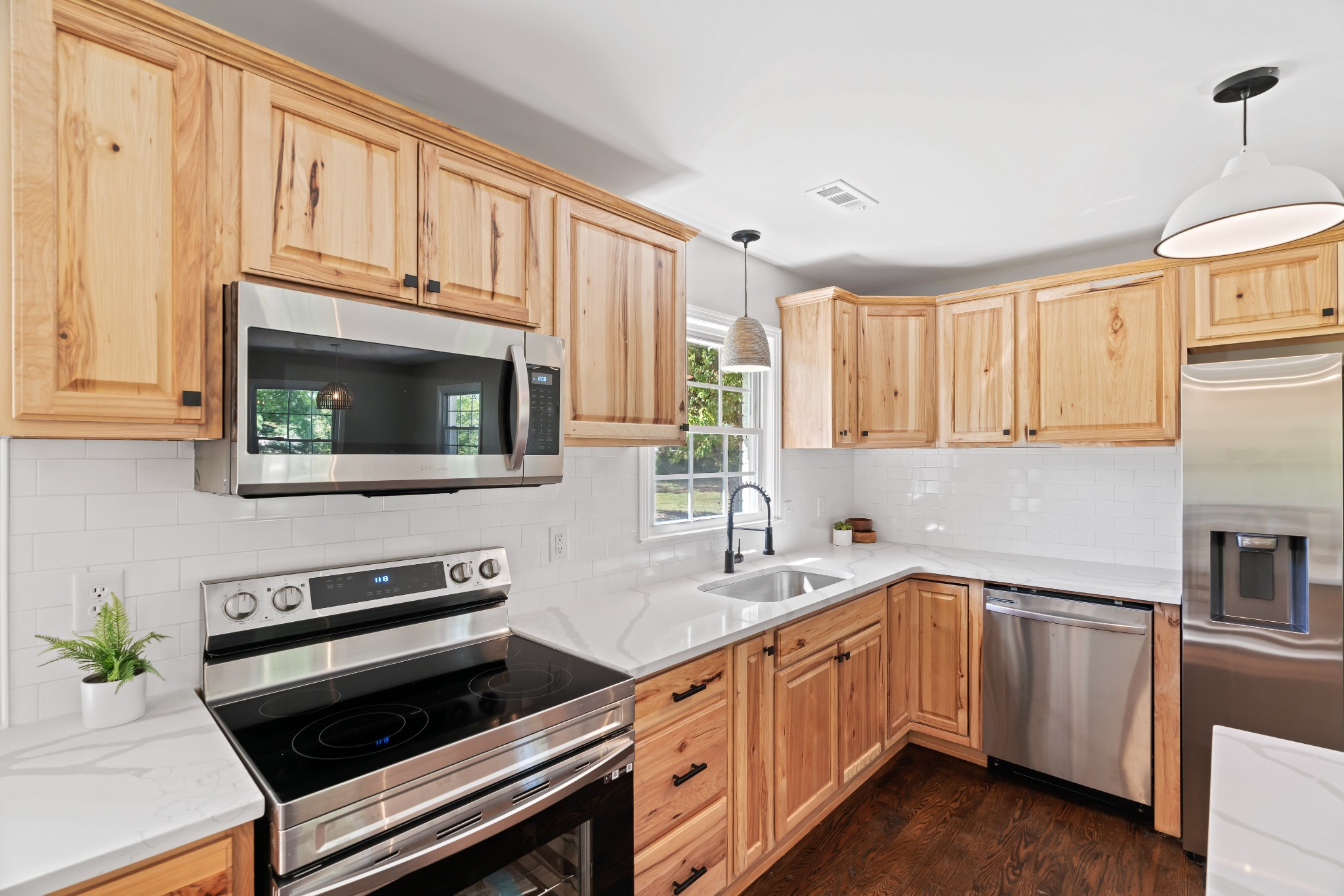 746 Clearview Road Cottontown, TN 37048 - Photo 23 of 64 a kitchen with a sink stove and microwave