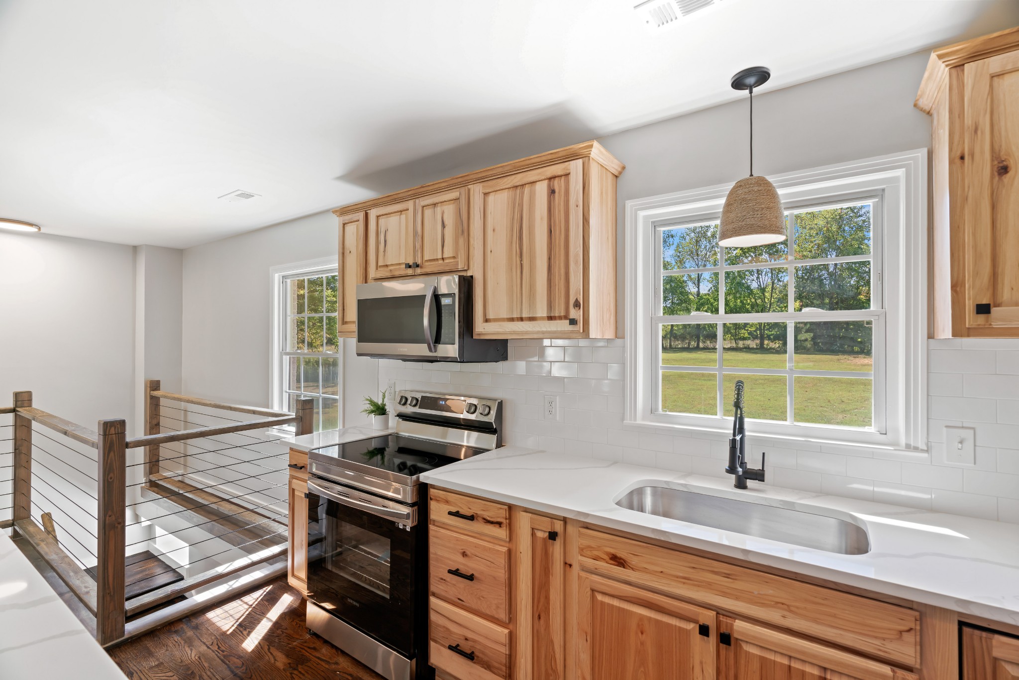 746 Clearview Road Cottontown, TN 37048 - Photo 25 of 64 a kitchen with stainless steel appliances a sink stove and cabinets