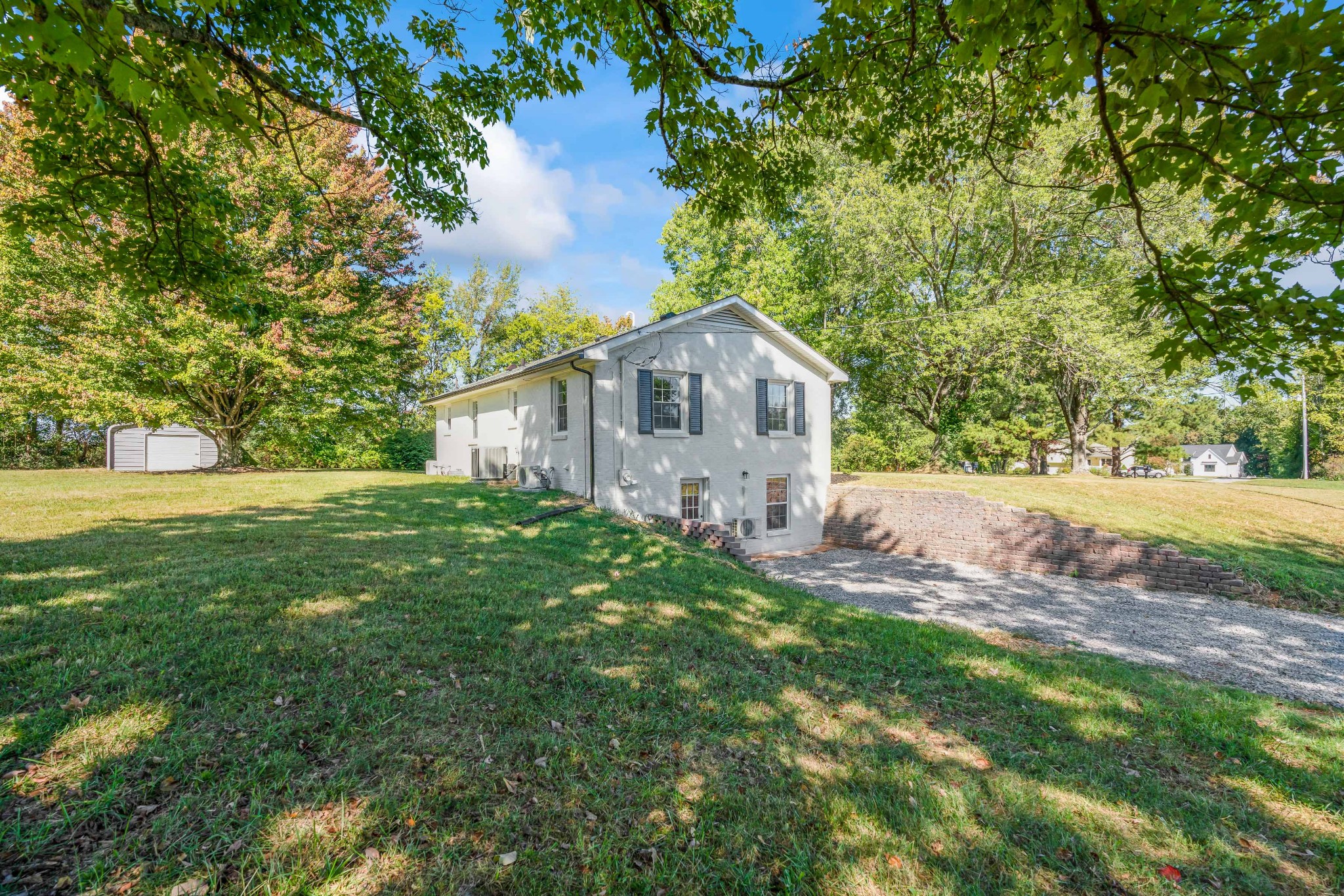 746 Clearview Road Cottontown, TN 37048 - Photo 54 of 64 a view of a house with backyard and garden