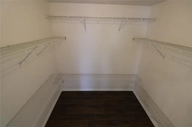 a view of a room with racks on the wall