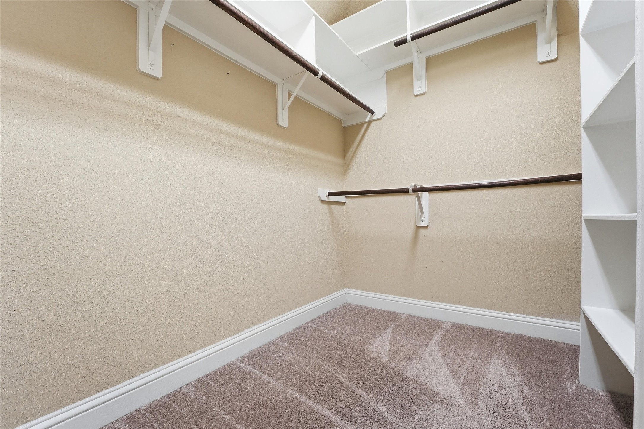 1911 Cedar Ridge Lane Pearland, TX 77089 - Photo 21 of 33 Primary bath with granite, double sinks, soaking tub, separate shower, and a large walk-in closet.