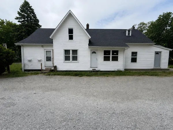 a front view of house with yard