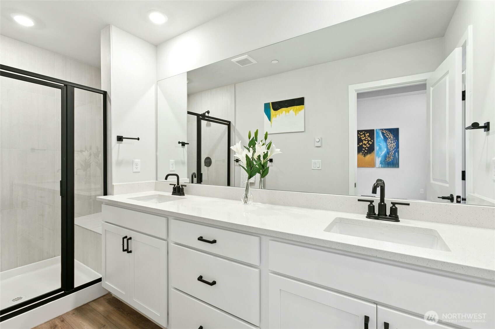 8609 Soper Hill Road, Unit G147 Marysville, WA 98270 - Photo 21 of 28 a bathroom with a double vanity sink and mirror