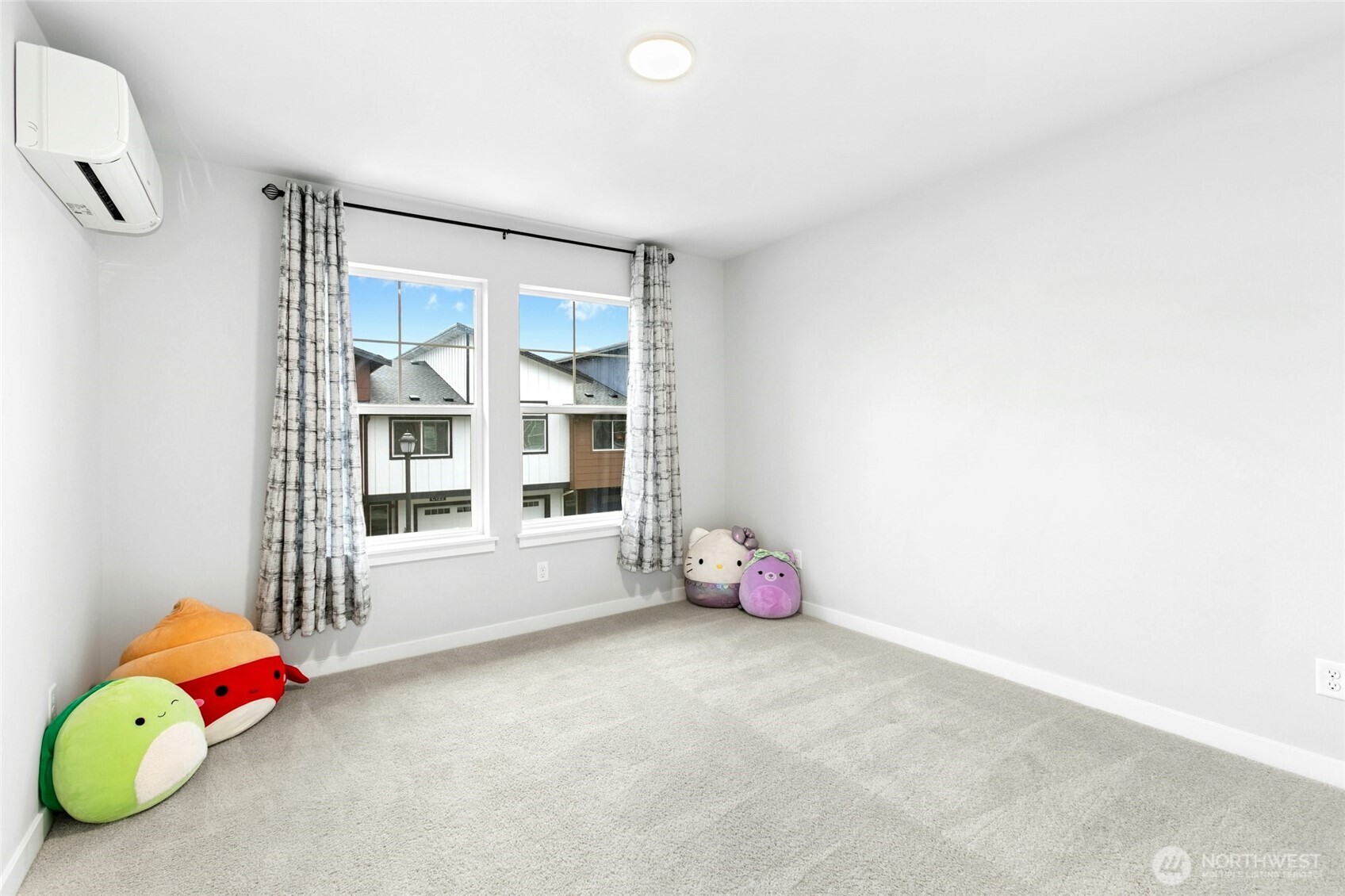 8609 Soper Hill Road, Unit G147 Marysville, WA 98270 - Photo 23 of 28 a view of a room with toys and dresser