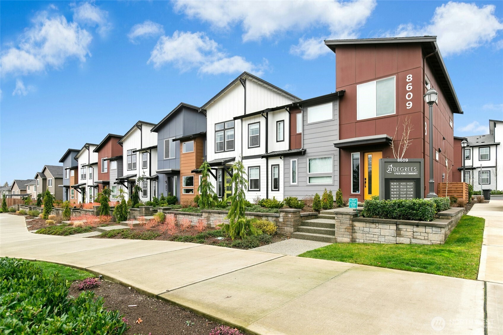 8609 Soper Hill Road, Unit G147 Marysville, WA 98270 - Photo 28 of 28 a front view of a house with a yard and plants