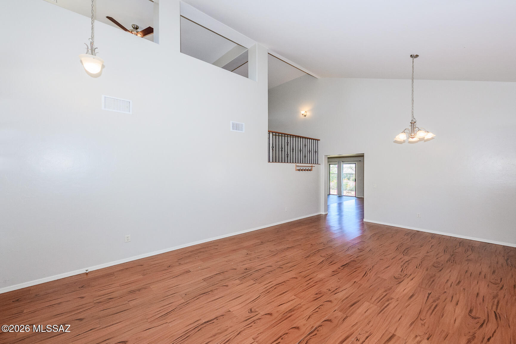 728 South Porter Routh Place Vail, AZ 85641 - Photo 5 of 36 a view of empty room with wooden floor