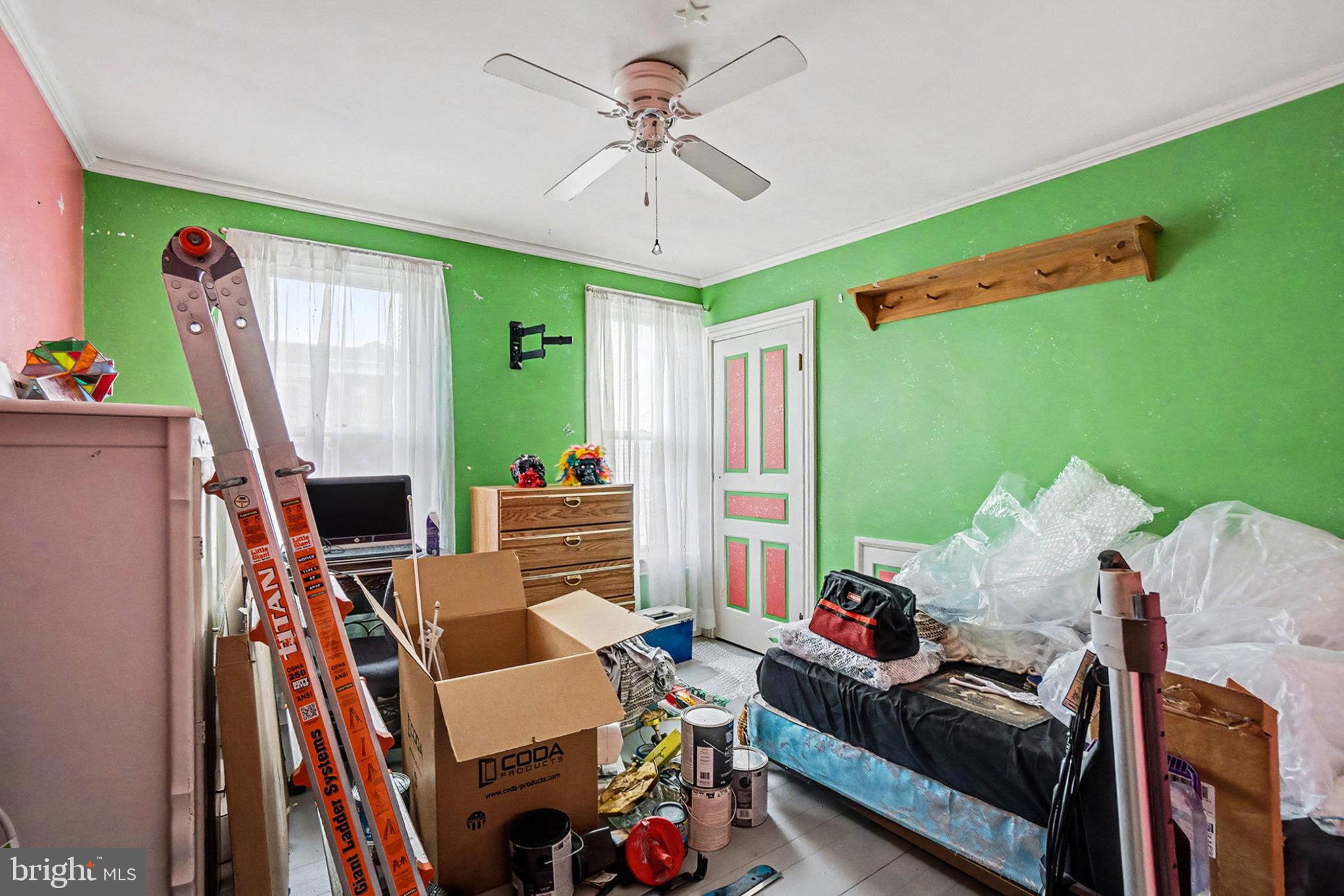 534 Main Street Lykens, PA 17048 - Photo 17 of 29 a living room with furniture a fireplace and a flat screen tv