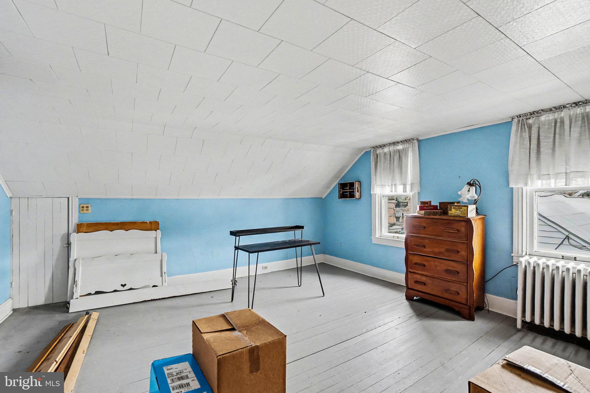 534 Main Street Lykens, PA 17048 - Photo 18 of 29 a room with furniture and a wooden floor