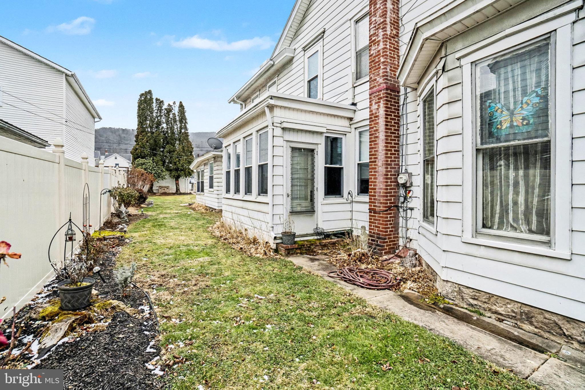 534 Main Street Lykens, PA 17048 - Photo 26 of 29 a front view of a house with a yard
