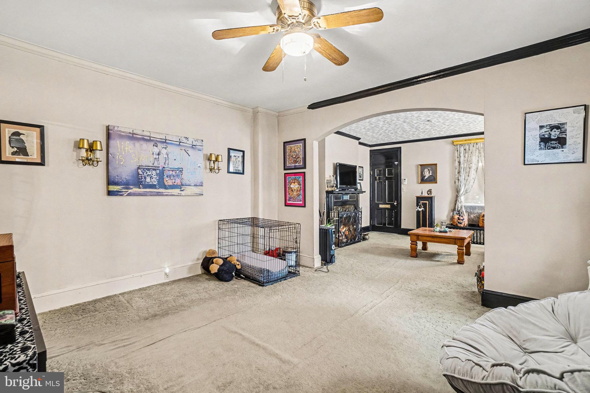 534 Main Street Lykens, PA 17048 - Photo 5 of 29 a living room with furniture and a chandelier