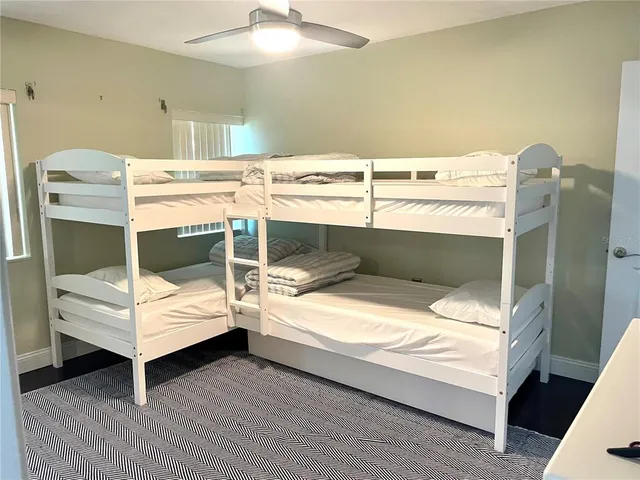 a view of swimming pool with chairs