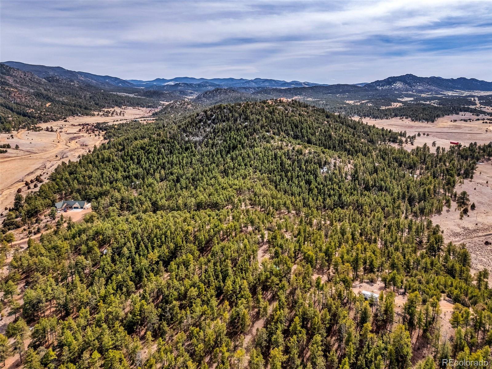 380 Buck Ridge Canon City, CO 81212 - Photo 3 of 28 a view of a city with mountains in the background